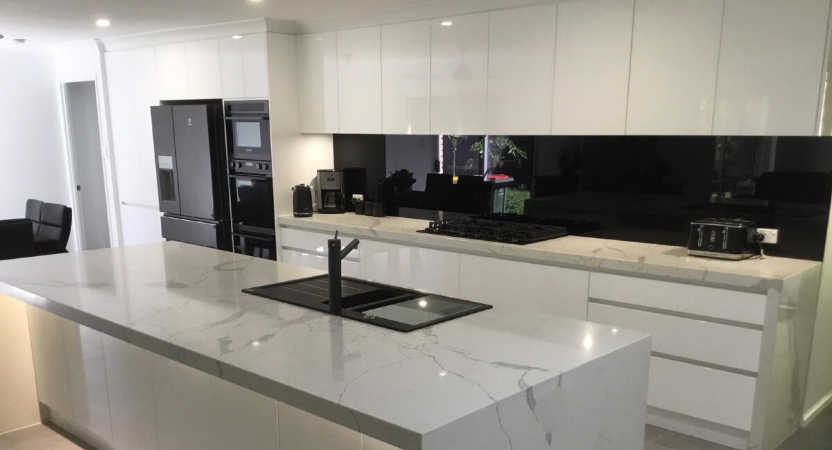 Rustic to Minimalist White Quartz Kitchen — after